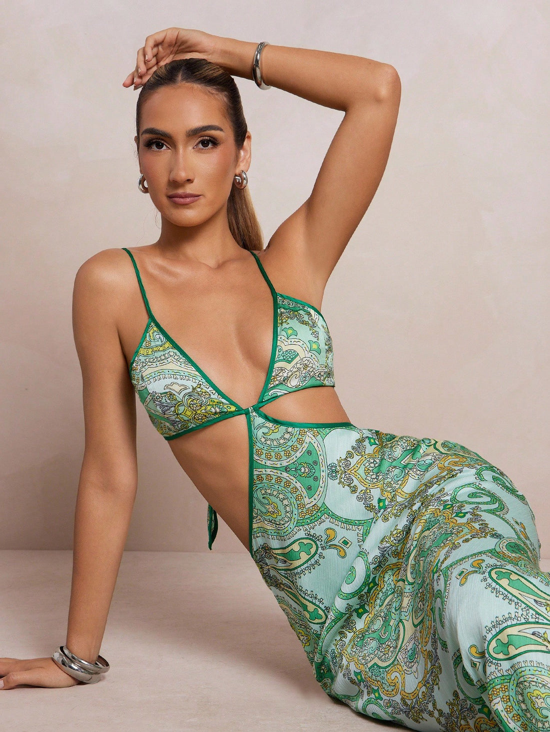 Step into effortless charm with this Elegant Women's Hollow-Out Maxi Shift Dress. Featuring delicate spaghetti straps and eye-catching hollow-out details, it’s perfect for turning heads at any occasion. Lightweight and breezy, this maxi dress combines comfort with style, making your look as playful as your spirit. Whether you’re out for a summer soirée or a casual day out, this dress keeps things fresh and flirty all day long.