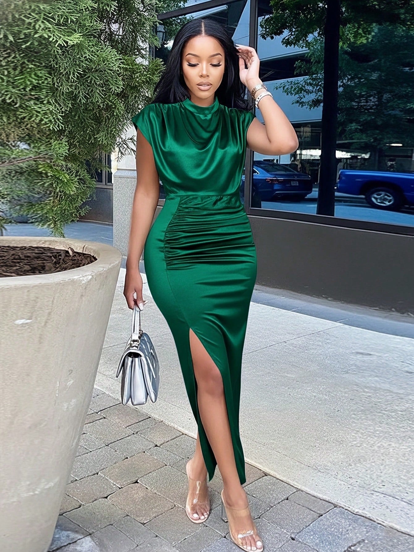 Elevate your everyday style with this stunning hooded long dress that effortlessly transitions from boardroom to brunch. The chic mandarin collar adds an unexpected twist, while the dramatic high slit keeps things modern and flirty. Whether you're crushing it at work or keeping it casual, this versatile piece becomes your go-to for looking polished without trying too hard. The cozy hood brings an edgy vibe that sets you apart from the crowd. Comfort meets sophistication in one show-stopping silhouette.