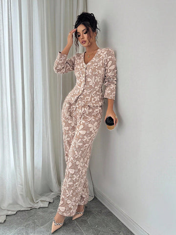 Elevate your wardrobe with this stunning jacquard long sleeve v-neck shirt set—where timeless elegance meets modern flair. Crafted with intricate jacquard detailing, this sophisticated piece features a flattering v-neckline and luxurious long sleeves perfect for layering or wearing solo. The refined texture adds visual interest to any outfit, making it ideal for both professional settings and elevated casual wear. Versatile, chic, and undeniably stylish, this set is your go-to for looking polished without t