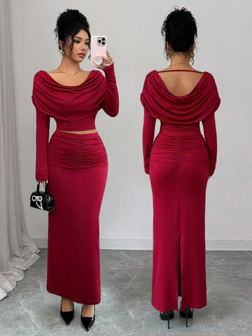 Elevate your seasonal soirée style with this charming two-piece knit set! The delicate ruffle collar adds a touch of whimsy to the fitted top, while the coordinating skirt offers effortless elegance. Crafted from cozy knit fabric, this pairing keeps you warm and wonderfully put-together through autumn gatherings and winter celebrations. Perfect for date nights, holiday parties, or any occasion calling for a dash of sophisticated fun. Mix, match, or wear together—this set is your new go-to for making an impr