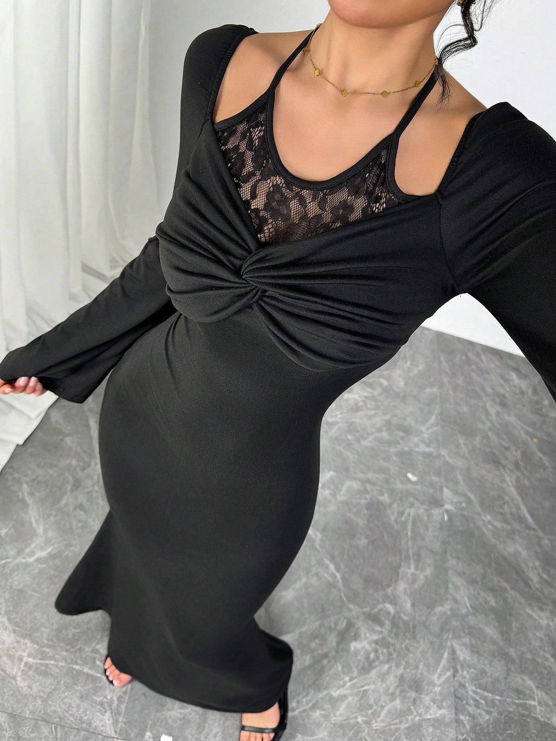 Be the belle of the ball in this elegant lace dress! The crisscross halter neck adds a touch of romance to any occasion. Showcase your curves in this fitted party dress, perfect for those special moments.