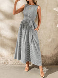 Get ready to turn heads with this versatile and playful Women's Linen Stripe Pocket Dress. With its elegant design and convenient pockets, you can effortlessly transition from casual outings to special occasions. The sleeveless style adds a touch of comfort and chicness, perfect for the fun-loving fashionista.