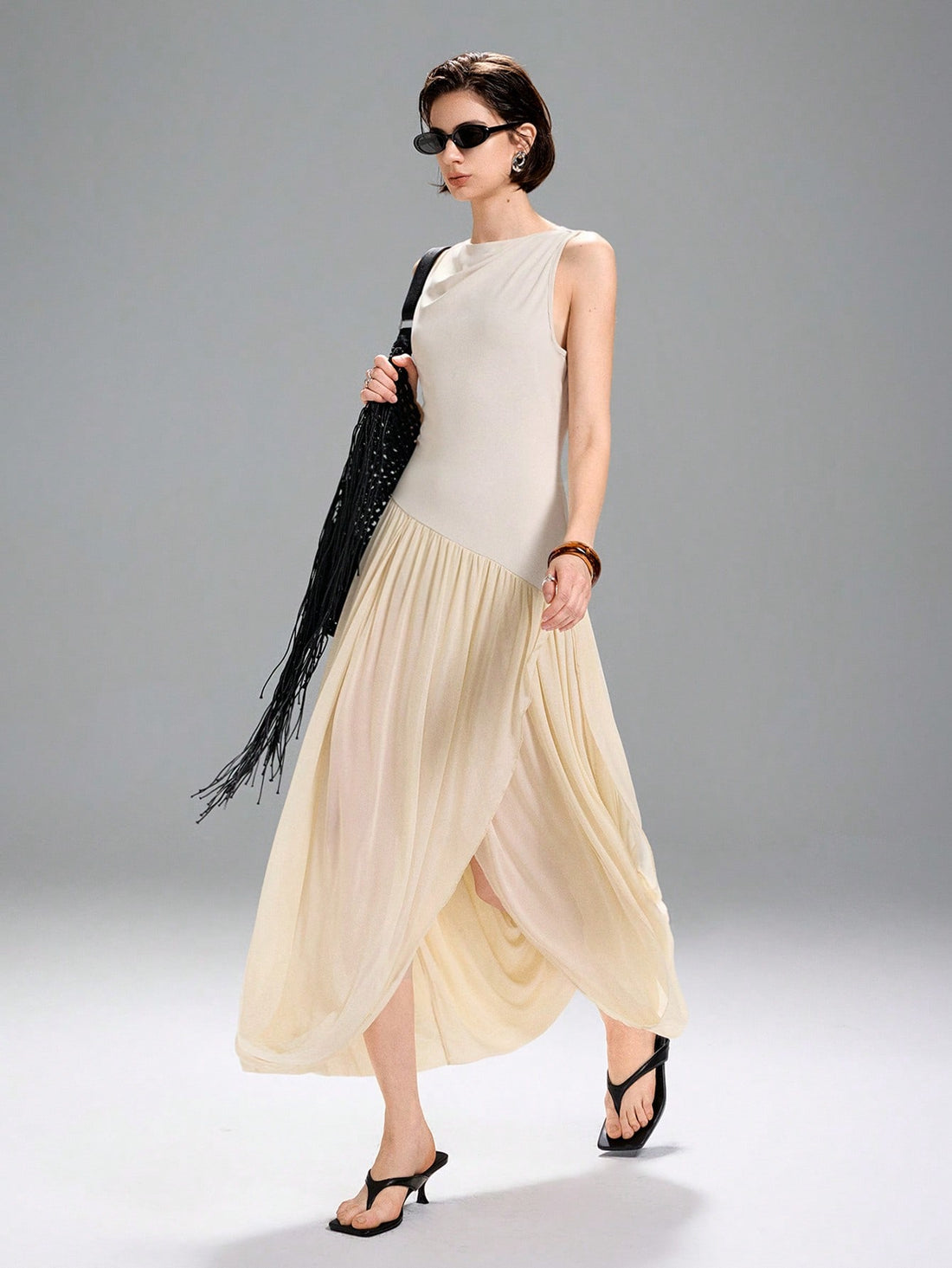 Step into sunshine and style with this Elegant Women's Long Dress, featuring a flowing skirt hem that dances with every step. Ideal for spring and summer, its breezy design keeps you cool while turning heads. Perfect for garden parties or casual strolls, this dress adds a playful touch to your warm-weather wardrobe.