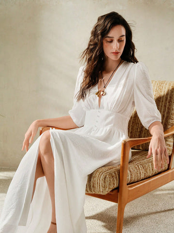 Add a touch of elegance to your wardrobe with this long dress featuring puff sleeves and a cinched waist. Perfect for both casual and formal occasions, this dress will make you feel confident and stylish. A versatile piece that will elevate any outfit!