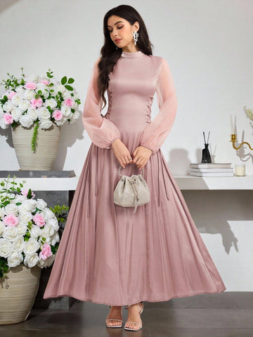 Step into autumn’s charm with this playful mid-length dress designed just for you. Featuring a chic stand collar and whimsical lantern sleeves, it adds a touch of fun flair to special occasions. The flattering silhouette and cozy fit make it your go-to for turning heads while staying comfortably stylish all season long.