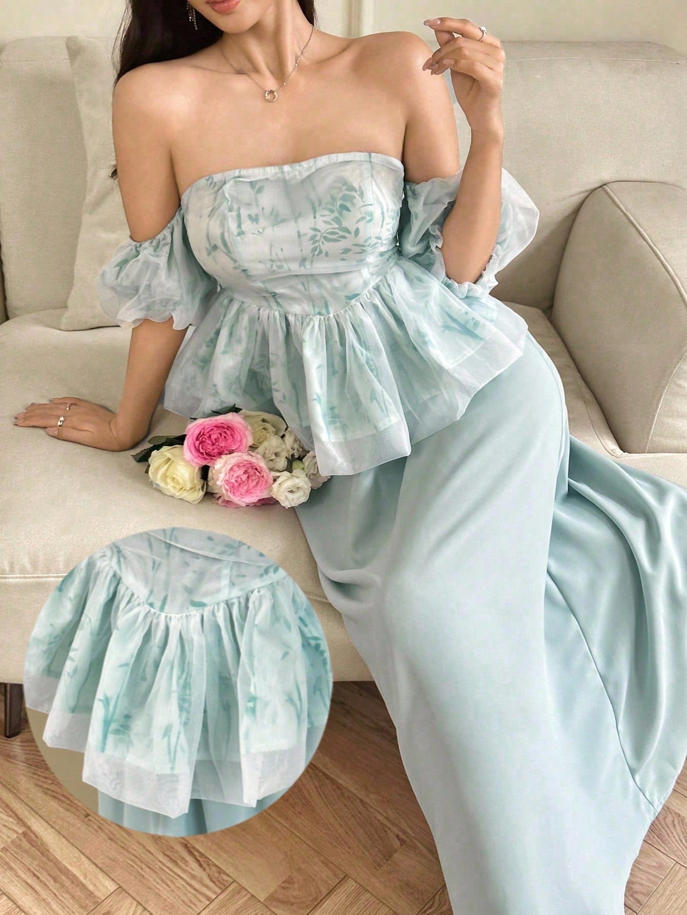 Elevate your wardrobe with this charming two-piece set that's equal parts sophisticated and fun. The off-shoulder top features delicate ruffles and a gorgeous plant print that brings nature-inspired elegance to your everyday style. Pair it with the flowing midi skirt for a complete look that transitions seamlessly from brunch to evening outings. Perfect for anyone who loves botanical vibes and effortless femininity. This set is your go-to for making a graceful impression without trying too hard.