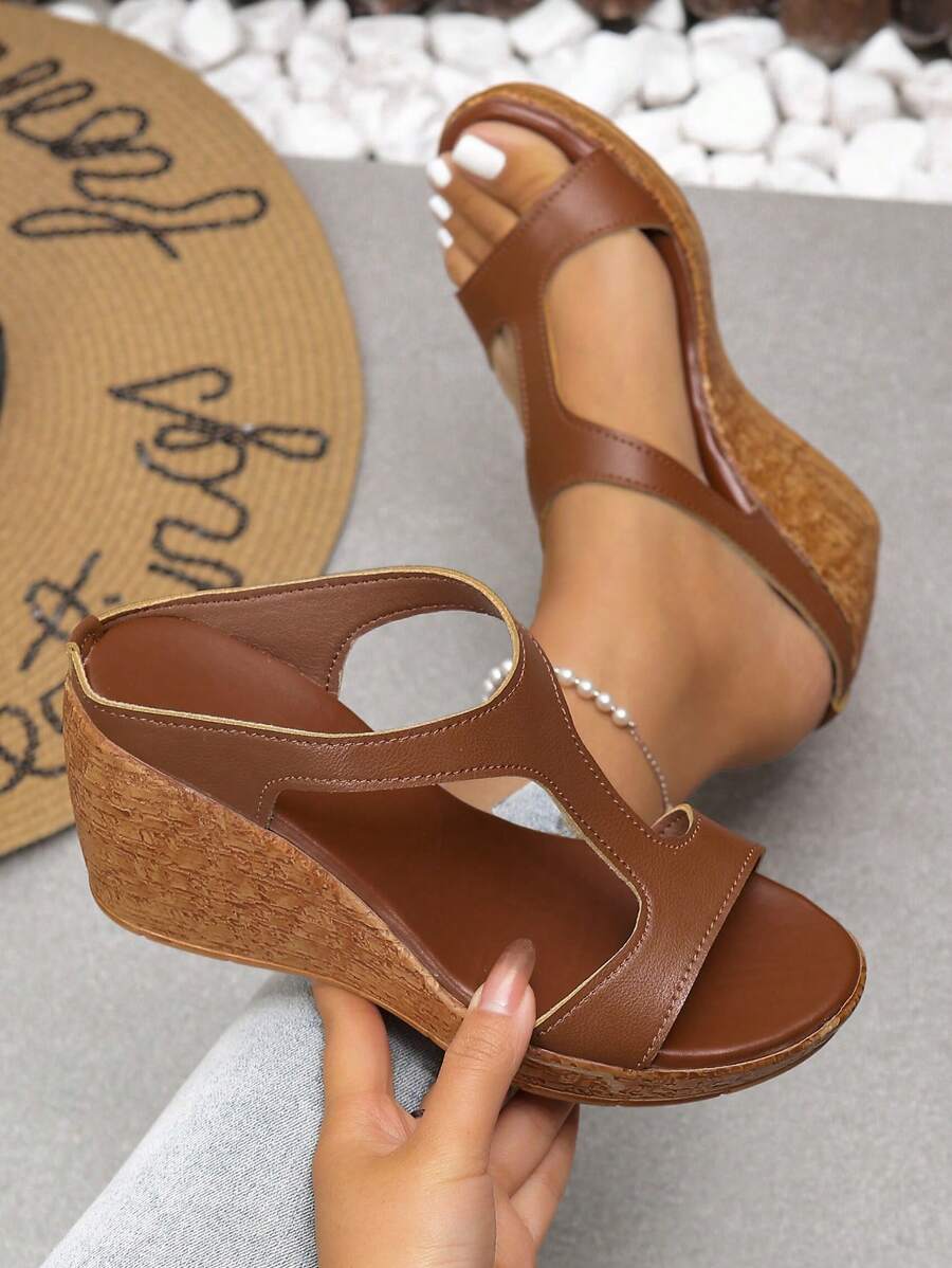 Step out in style with these Elegant Women's Platform Slide Sandals! Featuring a high wedge and open toe design, they add a fun lift to any outfit while keeping you steady with a non-slip sole. Perfect for sunny days and outdoor adventures, these slides blend comfort and fashion effortlessly. Get ready to turn heads and enjoy every step with a playful bounce!