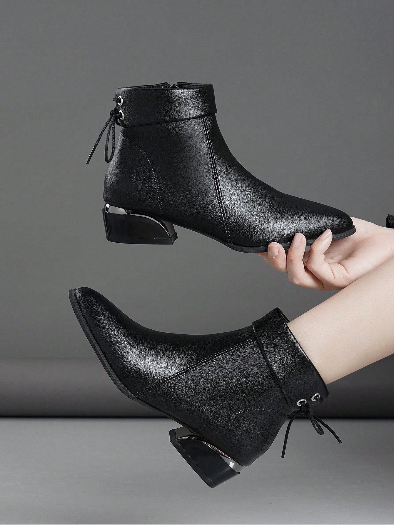 Step out in style with these playful short boots featuring a chic pointed toe and a charming bow detail. The shiny thick heels add a touch of sparkle, while the metal zipper ensures easy wear. Perfect for adding a fun, sophisticated twist to any outfit!