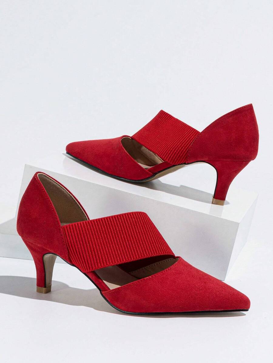 Elevate your everyday style with these sophisticated pointed-toe high heels. The elegant hollow-out design adds a modern touch, while the elastic band ensures a secure, comfortable fit for all-day wear. Perfect for transitioning from the office to evening events, these slip-on heels combine convenience with timeless elegance. The sleek silhouette flatters any outfit, making them an essential addition to your shoe collection.
