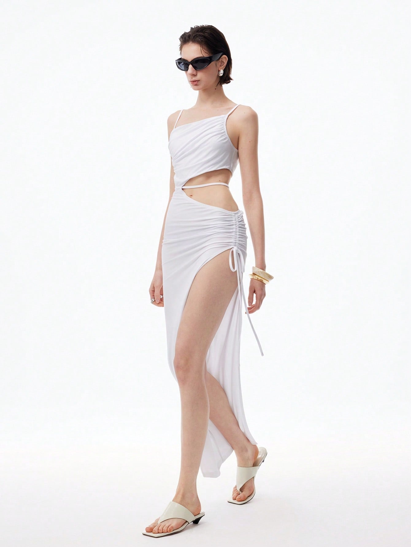 Step into sunshine with this Elegant Women's Pure White Smocked Hollow Maxi Skirt. Its airy, smocked design and delicate hollow details make it the perfect playful pick for spring and summer days. Flow freely and feel effortlessly chic wherever your adventures take you!