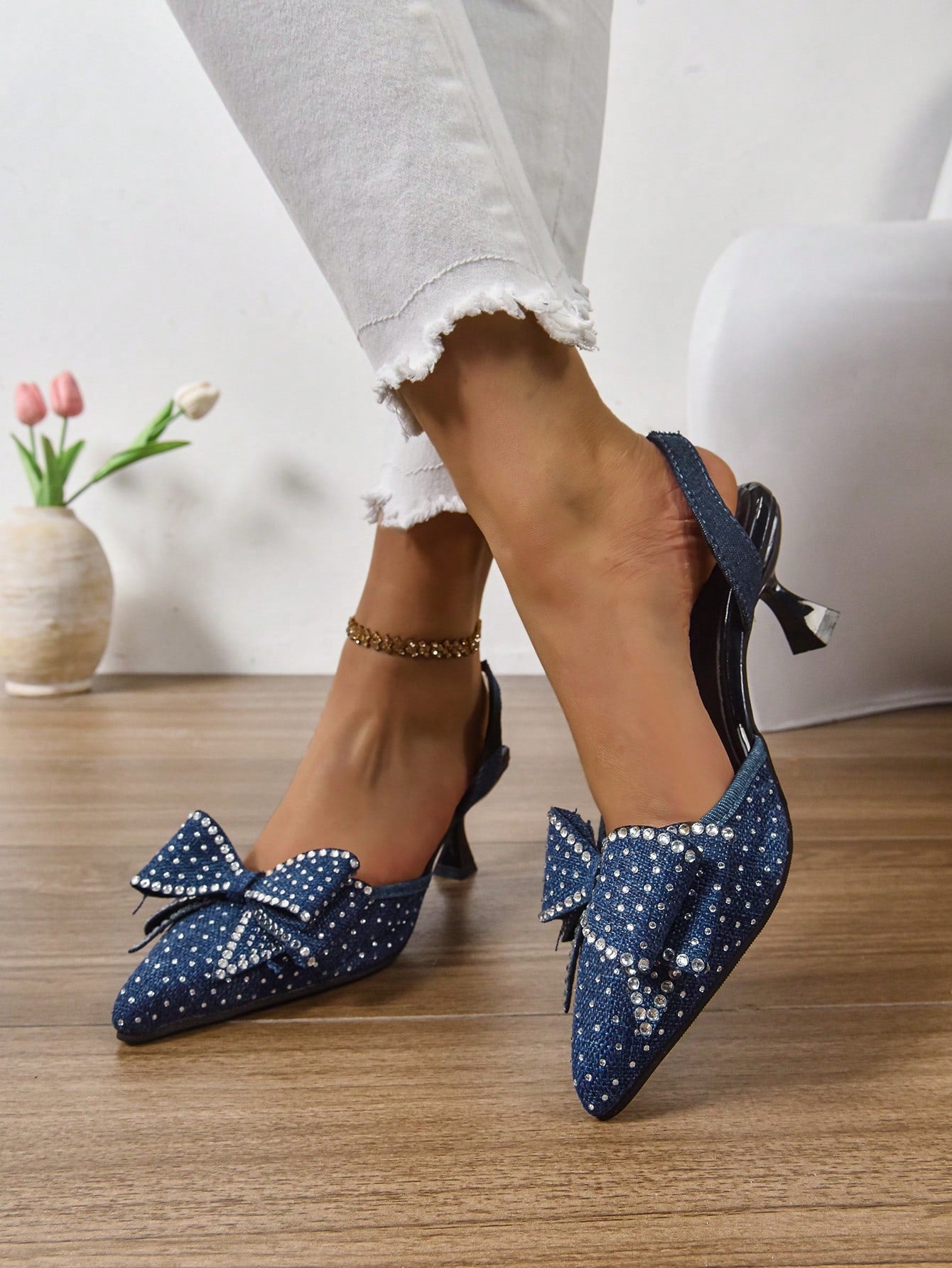 Enhance any outfit with these elegant high heels! With a rhinestone bow buckle and a sleek design, these heels are perfect for parties, weddings, and even office wear. Add some sparkle to your step and elevate your style effortlessly.