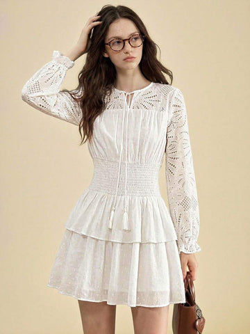 Embrace the essence of seasonal grace with this elegant Spring-Summer dress, a masterpiece of delicate craftsmanship designed for the modern romantic. Featuring intricate hollow embroidery that offers a hint of ethereal charm and a sophisticated bow tie neckline, this dress creates a refined and feminine silhouette perfect for garden weddings, afternoon tea, or upscale brunch dates. The cascading ruffle design adds a sense of playful movement and texture, while the lightweight, breathable fabric ensures you