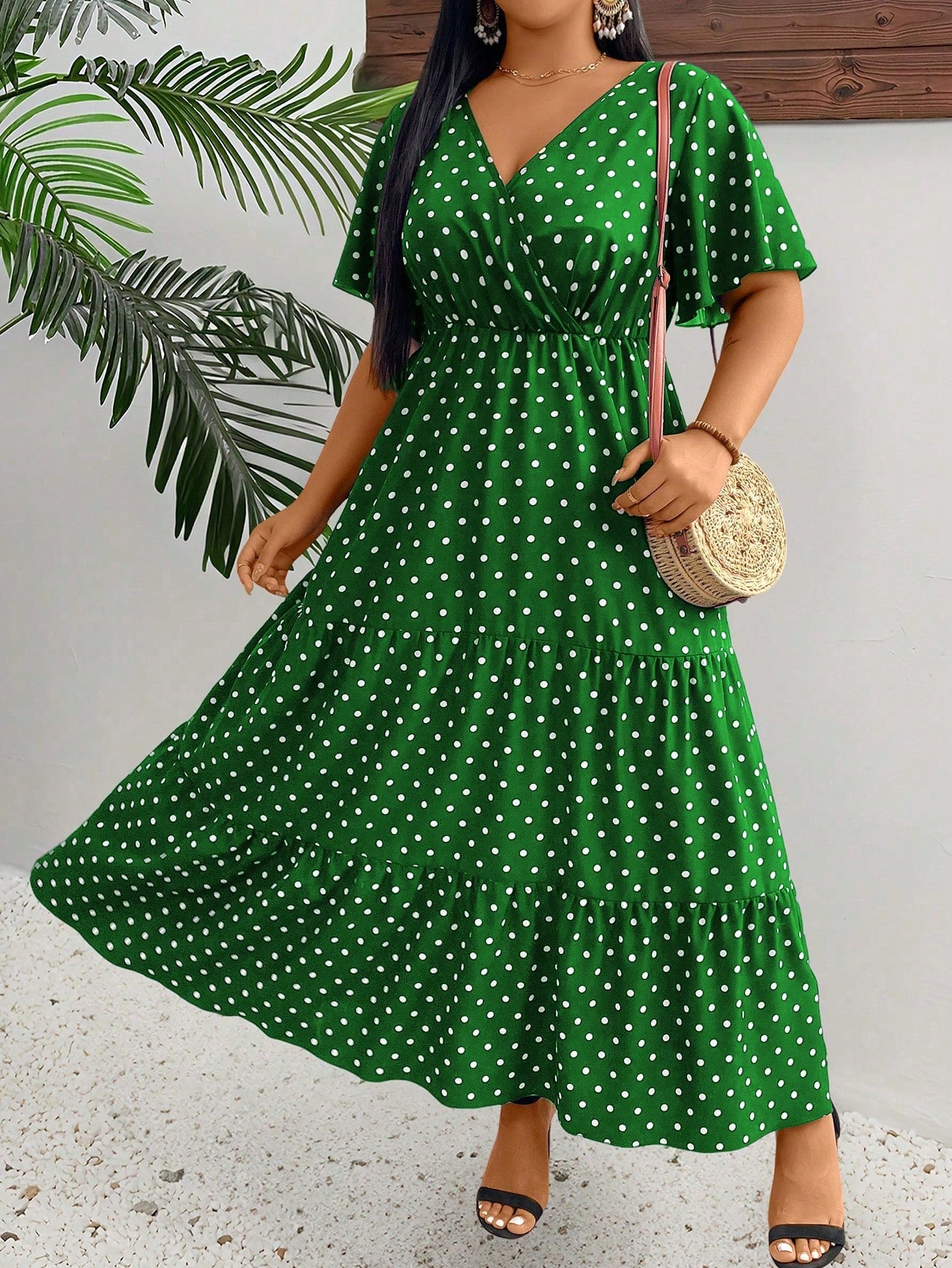Add some playful polka dots to your summer wardrobe with this stunning V-neck dress! The elegant ruffles and short sleeves add a touch of whimsy to this plus size outfit, perfect for Christmas or any occasion. Stay chic and comfortable with this stylish maxi dress.