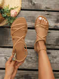 Step into summer with these elegant women’s sandals, featuring chic criss-cross straps and a classic flat Roman design. Perfect for sunny days and casual outings, these versatile sandals add a stylish flair to any outfit while keeping your feet comfy and cool. Whether you're strolling the beach or heading out for brunch, these high-end sandals will have you looking effortlessly fabulous.