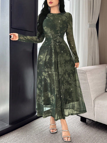 Step into effortless style with this playful mid-length dress, featuring a vibrant tie-dye print that adds a splash of fun to your wardrobe. The flattering waist tie accentuates your shape while the comfortable round neck keeps it casual chic. Perfect for sunny days or laid-back evenings, this dress brings a lively twist to your everyday look.