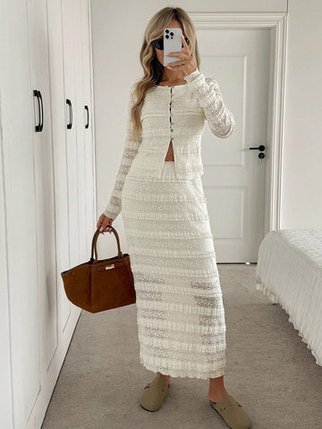 Elevate your cold-weather wardrobe with this chic two-piece set that's equal parts cozy and show-stopping. The fitted long-sleeve cropped tee pairs perfectly with a sleek bodycon skirt, creating an effortlessly polished silhouette that transitions from brunch to night out. Designed for autumn and winter layering, this set strikes the ideal balance between comfort and confidence. Whether you're dressing up or keeping it casual, this dynamic duo delivers major style points without the fuss.