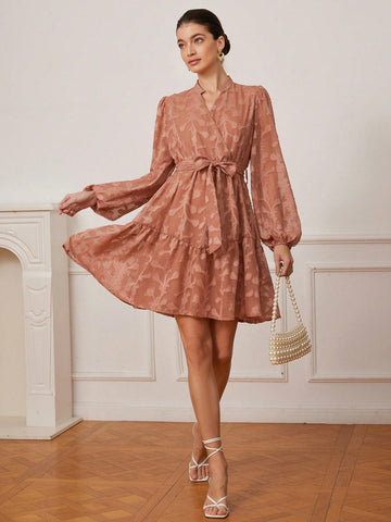 Step into spring and fall with flair in this playful V-neck mini dress, featuring a charming floral cutout design and a flattering waist belt that highlights your silhouette. Its breezy fit and vibrant pattern make it the perfect choice for sunny days and crisp evenings alike. Embrace effortless style and turn heads wherever you go!