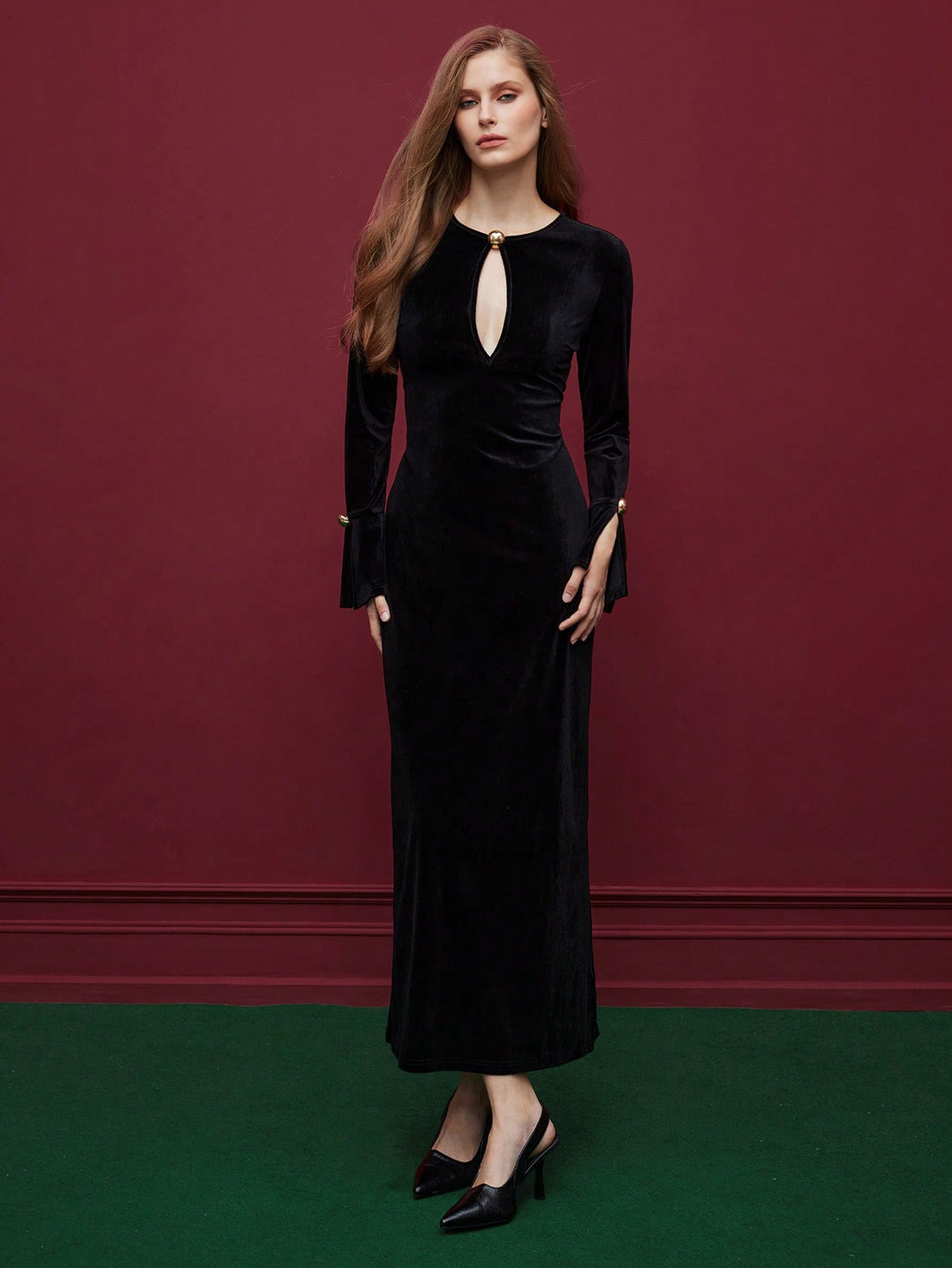 Step into autumn with charm in this elegant velvet midi dress. Its soft velvet fabric feels luxurious while the playful keyhole neck and open sleeves add a flirty touch. Perfectly tailored to highlight your silhouette, this dress keeps you cozy and stylish for cooler days and festive evenings alike. Embrace fall fashion with a twirl!