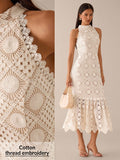 Step into the spotlight with this sleeveless crochet midi dress designed to flatter your waist and elevate your wedding guest style. Its delicate crochet detail adds a touch of whimsy, while the cinched waist ensures a perfect fit that celebrates your silhouette. Whether you’re dancing or mingling, this dress blends comfort with chic for a memorable celebration look.