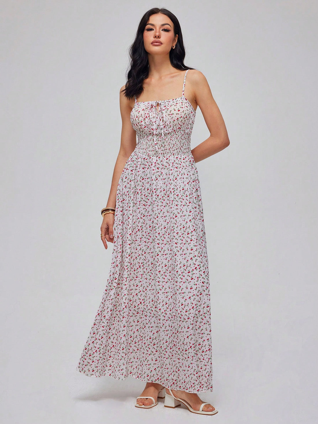 Turn heads effortlessly in this Elegant Women's Waisted Print Long Dress. Designed to flatter your figure with a cinched waist, its flowing fabric and vibrant print add a touch of playful charm. Perfect for any occasion, from garden parties to evening outings, this dress combines comfort and style for a look that's as chic as it is fun.