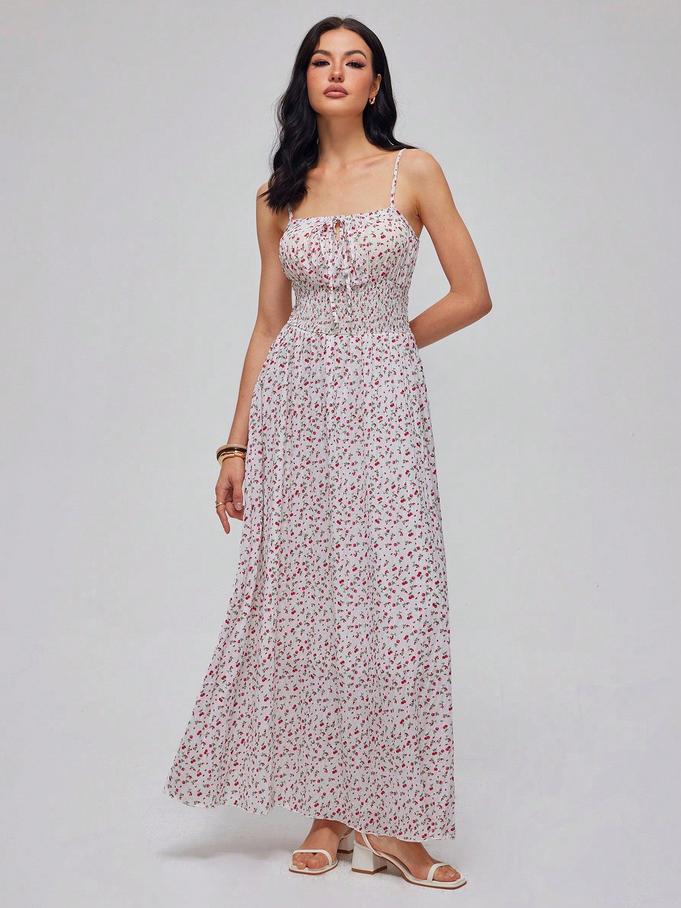 Turn heads effortlessly in this Elegant Women's Waisted Print Long Dress. Designed to flatter your figure with a cinched waist, its flowing fabric and vibrant print add a touch of playful charm. Perfect for any occasion, from garden parties to evening outings, this dress combines comfort and style for a look that's as chic as it is fun.