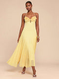 Pale yellow halter maxi dress with 3D floral bust lace-up front cutout and flowy skirt