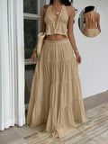 Effortless summer elegance meets everyday versatility with this stunning two-piece set. The halter top features a flattering neckline and breathable linen construction, while the ruffle maxi skirt adds graceful movement and dimension. Perfect for beach getaways, garden parties, or casual weekend outings, this yellow ensemble transitions seamlessly from day to night. 
