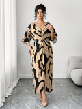 Make a statement in this fabulous Elenzga plus-size dress that's all about celebrating your unique style! The vibrant allover print catches every eye, while the V-neckline and flowing batwing sleeves create an effortlessly chic vibe. A playful twist at the waist adds dimension and keeps things interesting. Whether you're heading to brunch, a night out, or just want to feel amazing in your everyday, this elegant dress delivers comfort without compromising on pizzazz. Because looking good should always feel t