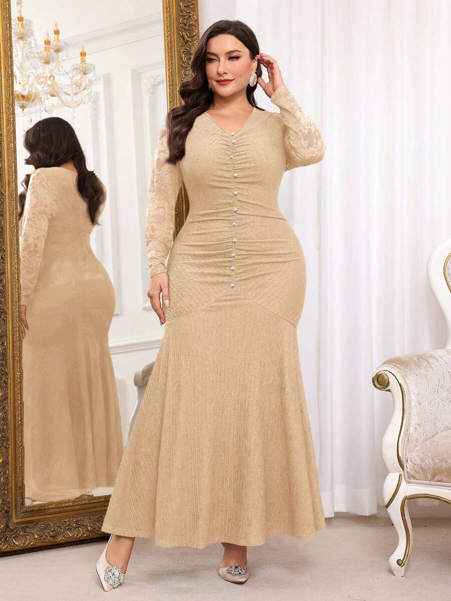 Step out in style with this playful plus size evening dress featuring a flattering V-neck and charming contrast lace details. The ruched bodice enhances your curves while the fishtail hem adds a flirty flair, perfect for dancing the night away. Designed to celebrate your elegance with a fun twist, this dress promises to keep you comfortable and effortlessly stunning at any special occasion.