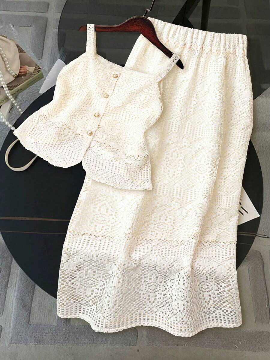 Embrace effortless elegance with this stunning two-piece boho set, perfect for beach days and festival celebrations. The delicate spaghetti-strap camisole features intricate hollow-out detailing and semi-sheer woven fabric in a warm apricot tone, while the flowing long skirt provides graceful movement. Crafted from a polyester-elastane blend with slight stretch, this regular0fit ensemble offers comfort and style for any occasion. Machine washable for easy care.