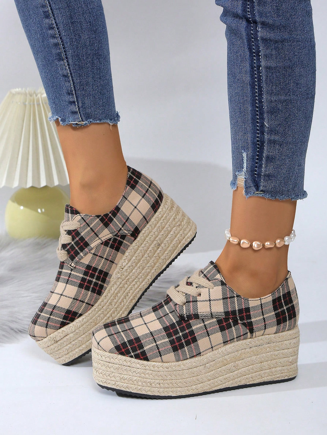 Level up your fashion game with our new Lace-Up Woven Platform Heels! Designed specifically for plus-size women, these heels will elevate your style (literally and figuratively). The woven detailing adds a unique touch, while the platform heel provides comfort and stability. Step up your shoe game today!