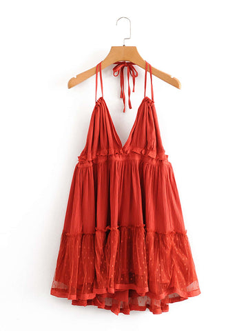 Unleash your fashion game with the playful Rosie layered halter dress! Elevate your style with this open-back piece, perfect for a night out with friends or a special date. Confidence and style will be effortlessly achieved with this unique and daring piece.