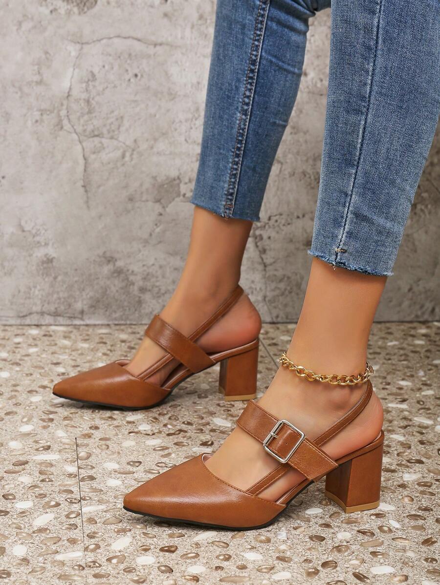 Step into sophistication with these stunning slip-on pumps designed to transform your spring and summer wardrobe. Featuring a sleek pointed toe and sturdy thick heel, they deliver both elegance and all-day comfort. The effortless slip-on design means you'll spend less time fussing and more time turning heads. Whether you're heading to brunch, the office, or an evening out, these versatile pumps are your ticket to looking polished and put-together. Elevate every outfit with a touch of timeless style.