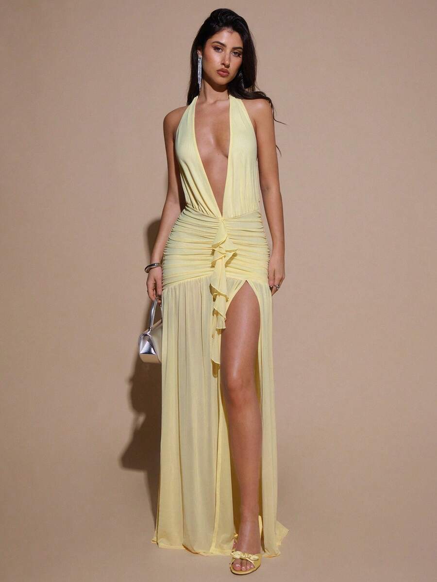 Exude Sun-Kissed Sophistication in Our Deep V-Neck Halter Bodycon Maxi Dress!

Experience the breathtaking fusion of high-octane glamour and sharp, modern architectural tailoring. This stunning yellow cream bodycon maxi is meticulously designed for the woman who values a high-fashion, "quiet luxury" approach to event dressing—the ultimate centerpiece for prestigious summer weddings, exclusive gala dinners, and high-authority formal occasions.

Iconic Halter Artistry: Featuring a masterfully curated deep V-n