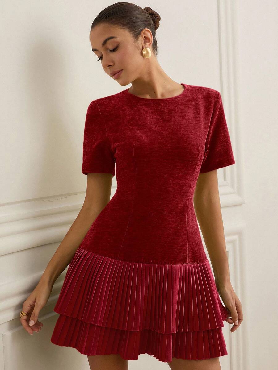 Discover the perfect blend of sophistication and fun with our Elegant Patchwork Pleated Dress. This stunning piece features a charming patchwork design that adds visual interest and personality to your wardrobe. The pleated detailing creates beautiful movement and dimension, while the slim fit flatters your silhouette for a polished look. Whether you're heading to brunch, a casual date, or weekend adventures, this dress effortlessly transitions from day to night. Mix timeless elegance with playful style—bec