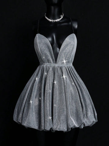 Shimmer and shine your way through any soirée in this eye-catching Silver Metallic Deep V Cami Dress! With its flirty neckline and party-ready metallic finish, you'll be turning heads faster than a disco ball. Perfect for fancy tea parties where you want to be the sugar cube that sparkles, or night events where you're aiming to outshine the moon. Slip it on and watch your confidence level skyrocket!