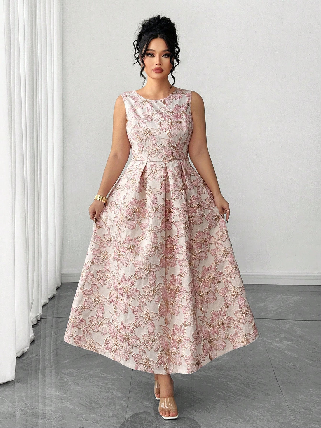 Step into timeless elegance with this stunning vintage pink jacquard sleeveless dress. The flattering flared silhouette celebrates your curves while the intricate jacquard fabric adds sophisticated texture and visual interest. Perfect for special occasions or elevated everyday wear, this plus-size piece combines retro charm with modern comfort. The sleeveless design keeps things breezy, while the classic cut ensures you'll reach for it season after season. Embrace your unique style and turn heads wherever y