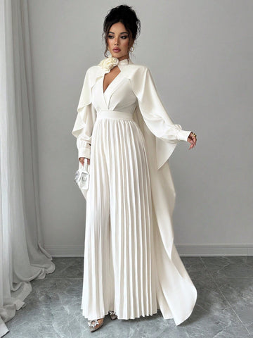 Make a statement with this stunning Elenzga 2-piece set that transforms your everyday wardrobe into something extraordinary. The luxe shawl collar top pairs perfectly with the eye-catching 3D floral wide-leg jumpsuit, creating an effortlessly chic ensemble that works for brunch, date night, or any occasion demanding a little extra pizzazz. The flowing silhouette flatters every figure while the dimensional florals add depth and visual interest. Whether you're channeling your inner fashionista or just ready t