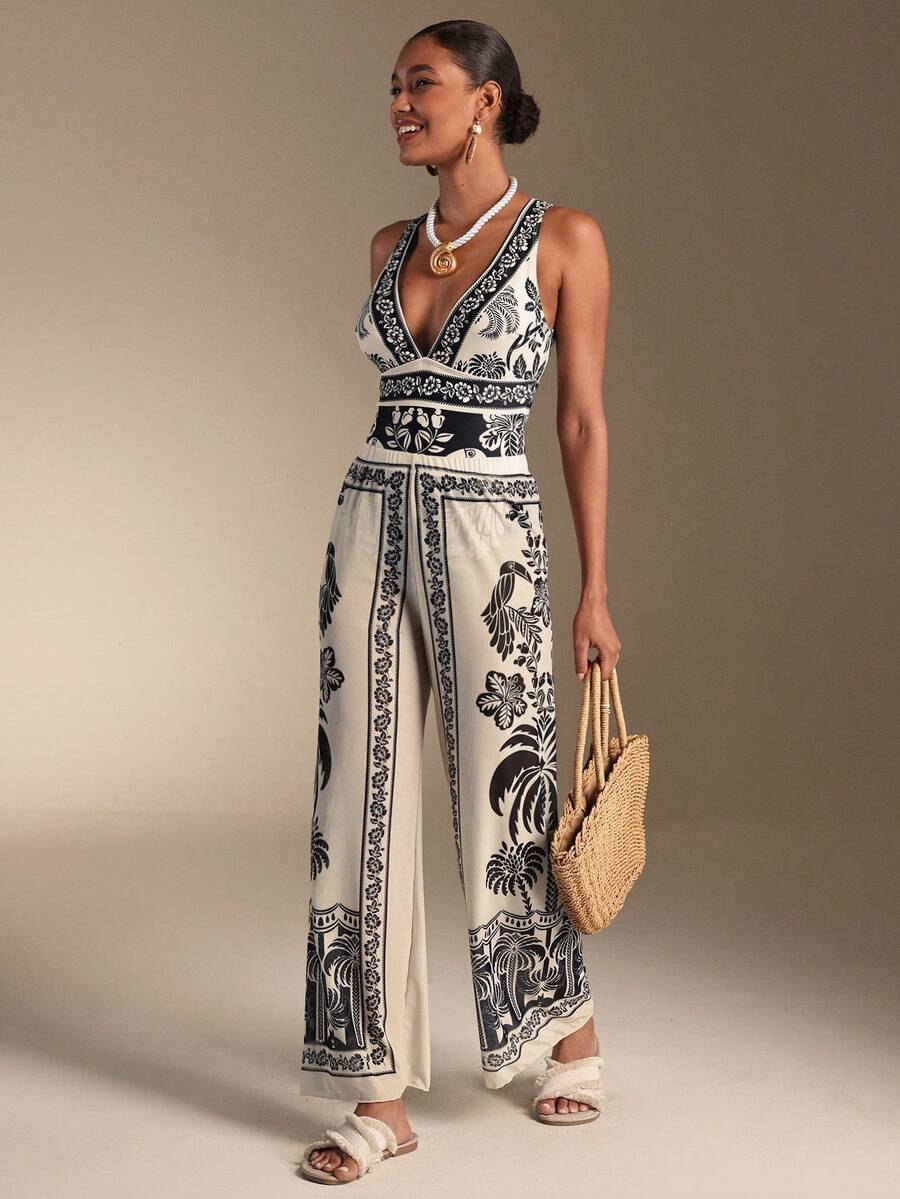 Embrace effortless coastal elegance with this stunning black and white seashell-inspired boho one-piece swimsuit paired with a matching skirt. The intricate seashell pattern brings a touch of oceanic charm, while the classic one-piece silhouette offers flattering coverage and timeless appeal. The coordinating skirt adds versatility—wear it poolside for a complete beach look or pair the swimsuit alone for swimming