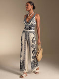 Embrace effortless coastal elegance with this stunning black and white seashell-inspired boho one-piece swimsuit paired with a matching skirt. The intricate seashell pattern brings a touch of oceanic charm, while the classic one-piece silhouette offers flattering coverage and timeless appeal. The coordinating skirt adds versatility—wear it poolside for a complete beach look or pair the swimsuit alone for swimming