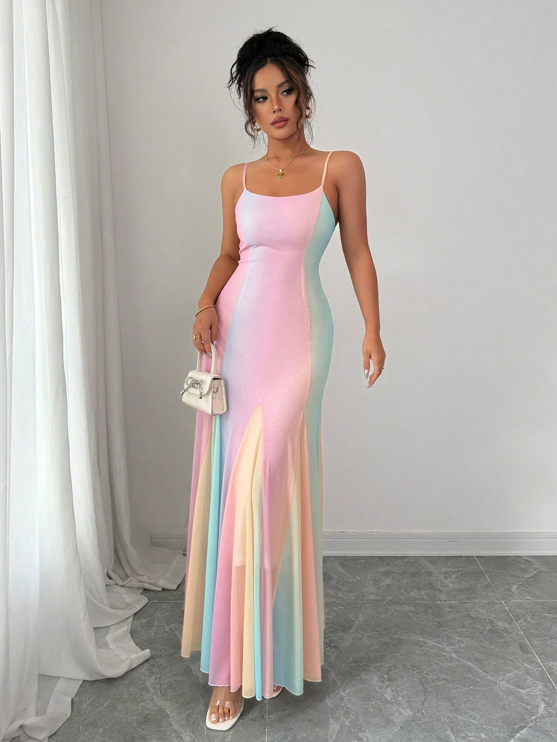 Step into sunshine with the Rafferiza Rainbow Chiffon Vacation Dress! Light and airy, its colorful chiffon fabric and delicate spaghetti straps make every summer day feel like a breeze. Perfect for beach strolls or evening adventures, this dress adds a splash of joy to your vacation wardrobe while keeping you cool and carefree.