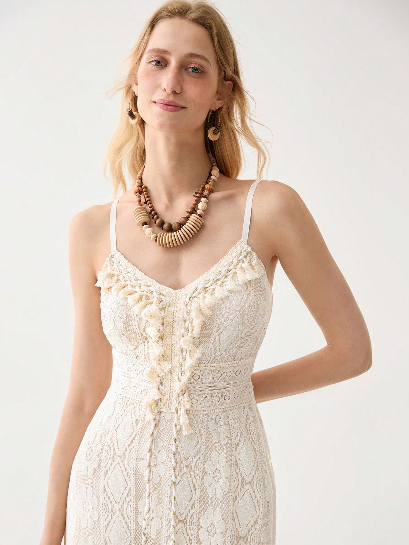 Step into summer with the Florisole Solid Color Lace Camisole Dress! This flirty number combines delicate lace details with a breezy silhouette that's perfect for sunny days and warm nights. The versatile solid color pairs with everything, while the camisole style keeps you cool and comfortable. Dress it up with heels or down with sandals—either way, you'll be turning heads and collecting compliments!