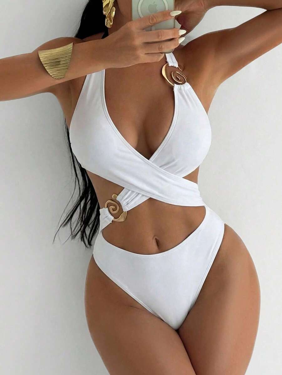 Make a statement at the pool or beach with this sophisticated one-piece swimsuit designed for confidence and style. The solid construction offers timeless elegance, while thick supportive straps and a striking crisscross back detail provide both comfort and visual interest. Gold accents add a touch of luxury to this flattering silhouette. Perfect for swimmers who want coverage without compromising on fashion-forward design.
