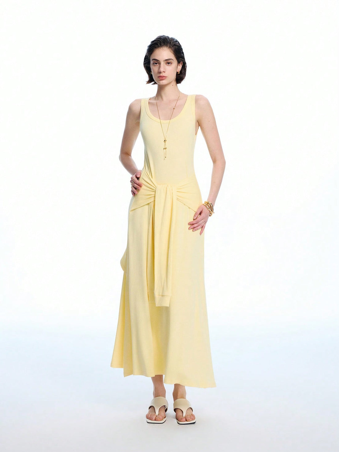 Step into effortless style with this minimalist U-neck two-piece long dress, designed to keep you cool and chic all spring and summer. Its breezy silhouette and flattering neckline make it perfect for casual outings or sunny strolls. Mix and match or wear together for a fresh, playful look that elevates your everyday wardrobe.