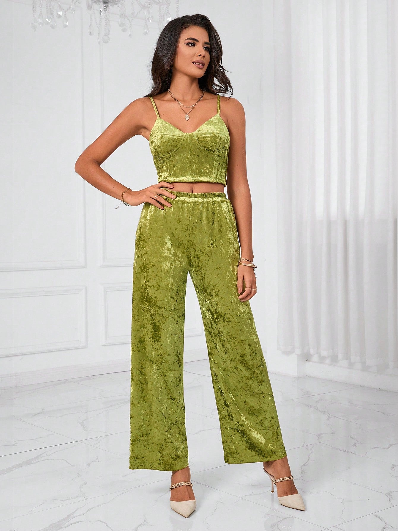 Slip into luxury with this velvet cami and wide-leg pants duo that's ready to turn heads. The silky-smooth cami drapes beautifully while the relaxed pants offer all-day comfort without sacrificing style. Whether you're dressing up for a night out or keeping it casual, this set brings that effortless elegance we all crave. Soft, sophisticated, and seriously fun to wear—your wardrobe just got a major upgrade!
