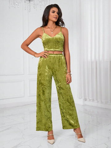 Slip into luxury with this velvet cami and wide-leg pants duo that's ready to turn heads. The silky-smooth cami drapes beautifully while the relaxed pants offer all-day comfort without sacrificing style. Whether you're dressing up for a night out or keeping it casual, this set brings that effortless elegance we all crave. Soft, sophisticated, and seriously fun to wear—your wardrobe just got a major upgrade!