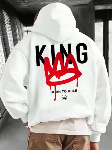 Stay warm and stylish with our Men's Slogan Print Hoodie. Made for embracing casual coolness, this hoodie features an eye-catching slogan print that adds a trendy touch to any outfit. Crafted with quality materials, it's the perfect addition to your wardrobe for a comfortable and fashionable look.