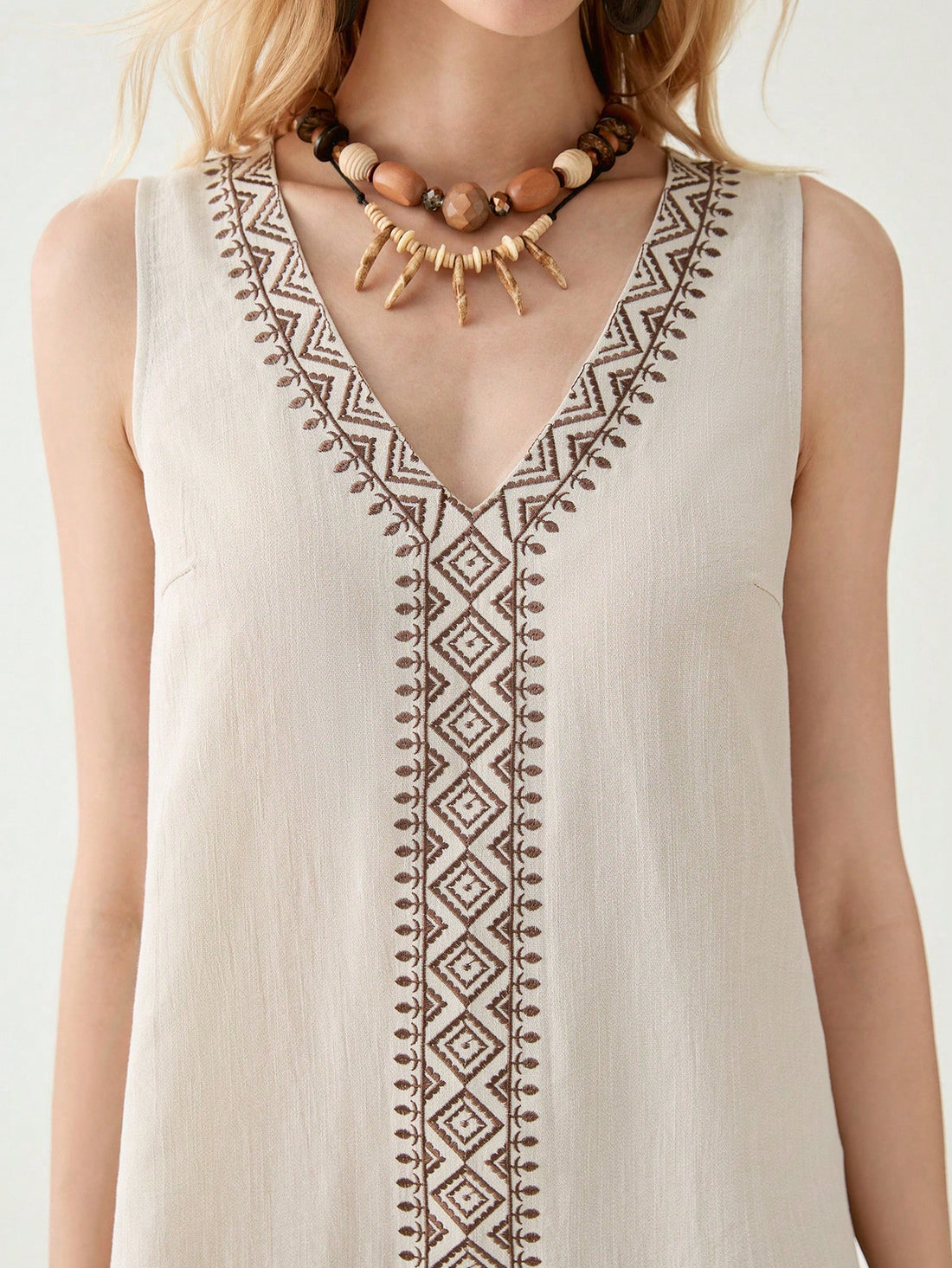 Float through summer days in our V-Neck Linen Embroidered Sleeveless Casual Dress! This breezy number combines delicate embroidery with lightweight linen for that perfect "I just threw this on but look amazing" vibe. The flattering V-neck shows just enough skin, while the sleeveless design keeps you cool when the temperature rises. Dress it up with heels or down with sandals – either way, you'll be turning heads without even trying!