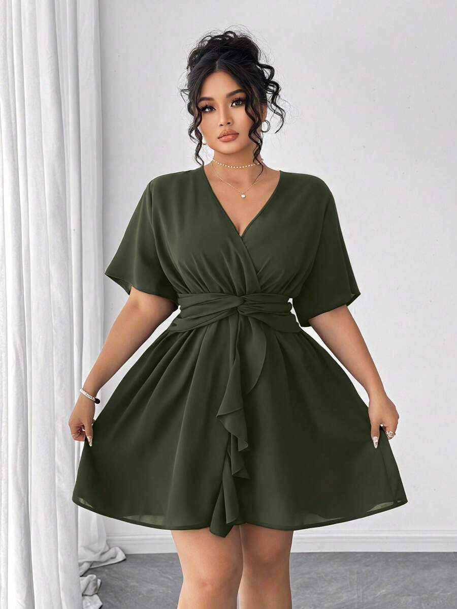 Turn heads this summer with our Plus Size Sexy Cross V-Neck Twist Tie Mini Dress. Featuring a flirty ruffle hem and a playful twist tie detail, this dress combines comfort and style effortlessly. Its flattering cross V-neck design enhances your curves, making it perfect for sunny days and warm nights. Embrace your confidence and enjoy the season in this fun, feminine mini dress made just for you.