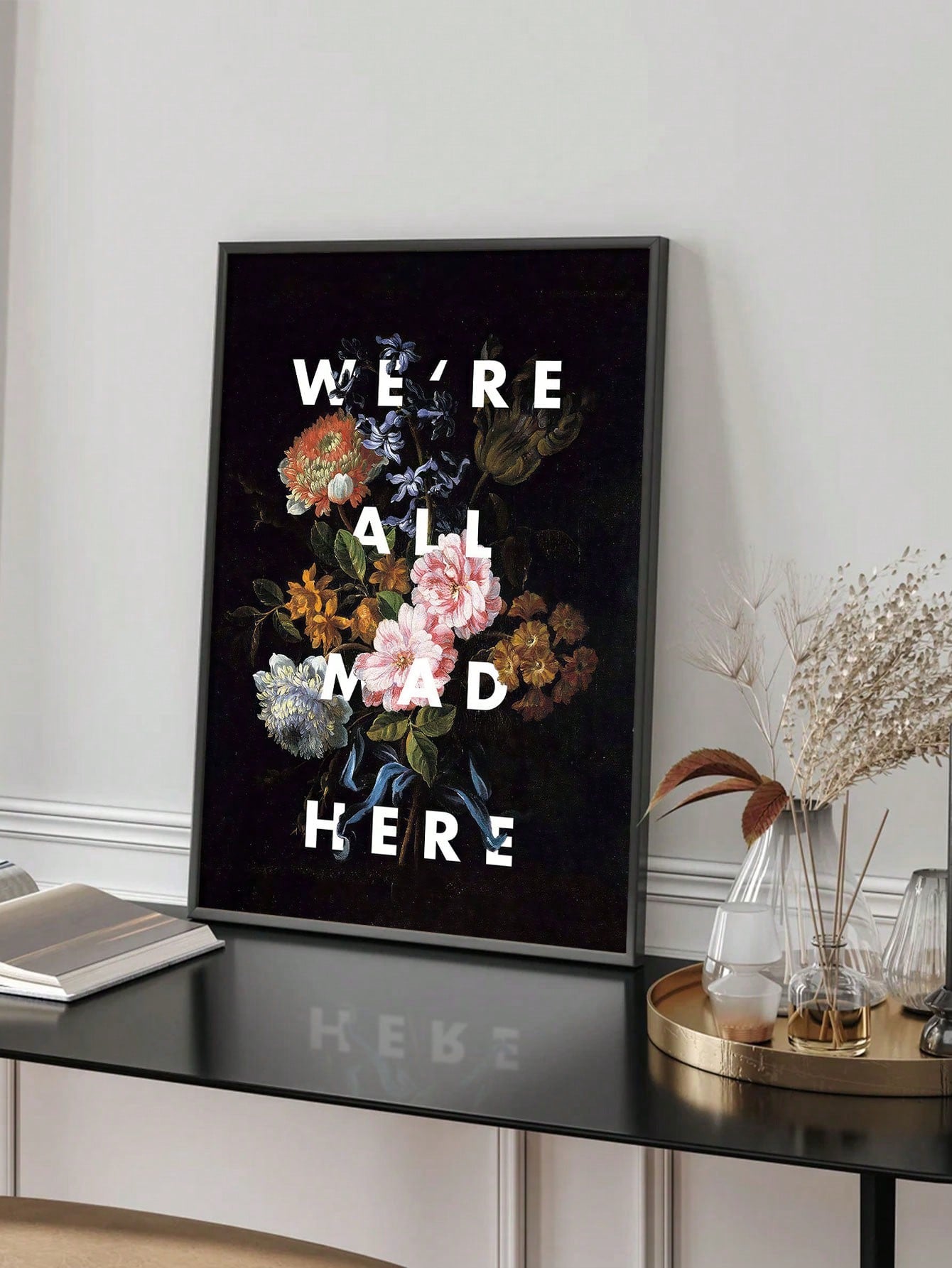Add some quirk to your home decor with our 'We're All Crazy' dark floral canvas art print. Let your personality shine with this unique and playful piece that celebrates the beauty of being different. Embrace the quirky and make a statement with this fun and stylish addition to your home.